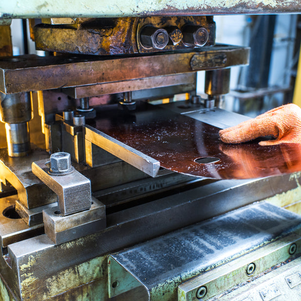 Metaplex metal stamping operation using automated punch presses to produce precision metal parts for automotive, electronics, and industrial applications.